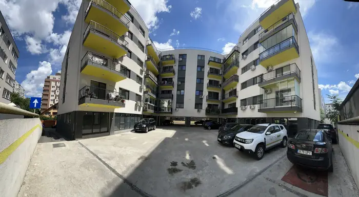 Colțul clădirii Dristor Apartments, zonă rezidențială liniștită